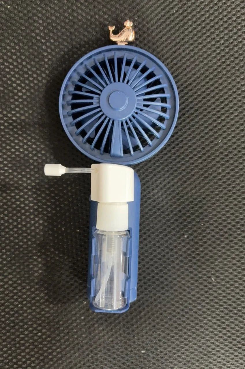 USB personal desk fan with plastic nozzle in five colour options on a desk