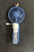 USB personal desk fan with plastic nozzle in five colour options on a desk