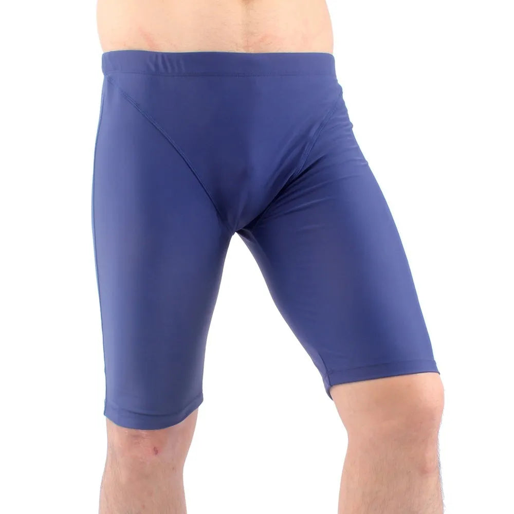 Men's green and navy blue quick-dry swimming trunks with anti-embarrassment lining, loose plus-size fit.