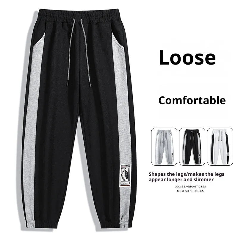 Men's casual wide leg fleece lined trousers in black, front view, showing drawstring waist and straight leg silhouette