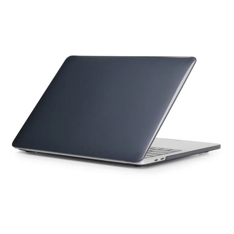 Transparent and black PC protective cases for Apple MacBook Pro 14.2-inch and 16.2-inch laptops.