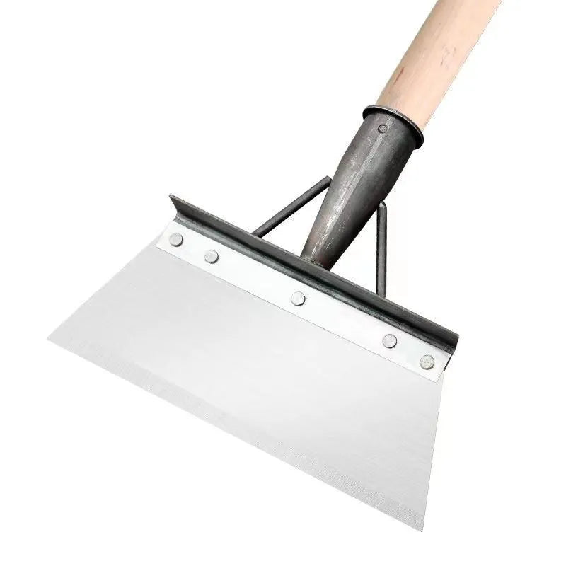 Manganese steel cleaning shovel with a tool steel head, shown in a garden setting.