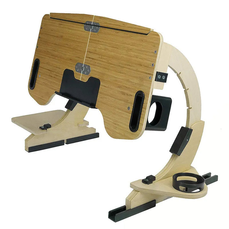 White maple wooden folding bed desk with laptop at an adjustable angle on a duvet.