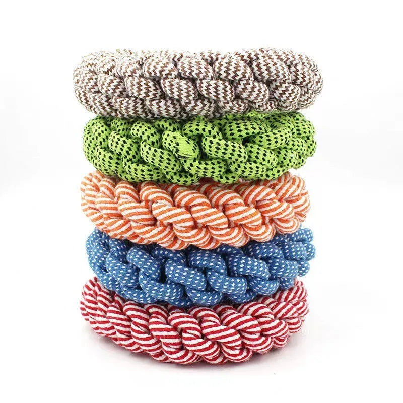 Cotton braided ring dog chew toy showing textured woven surface and approximate 18cm diameter