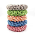 Cotton braided ring dog chew toy showing textured woven surface and approximate 18cm diameter