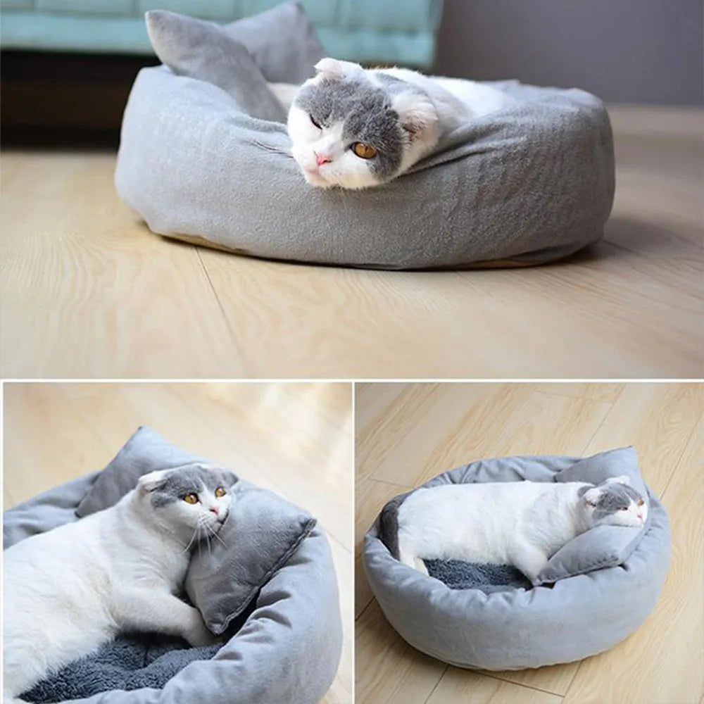 Grey round plush pet bed with a raised rim and non-slip base for small dogs and cats.