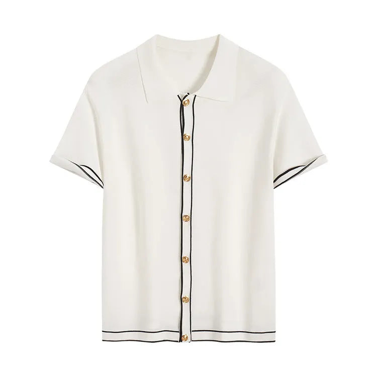 White short-sleeve cardigan with dark contrast lapels, buttoned front, and relaxed fit.