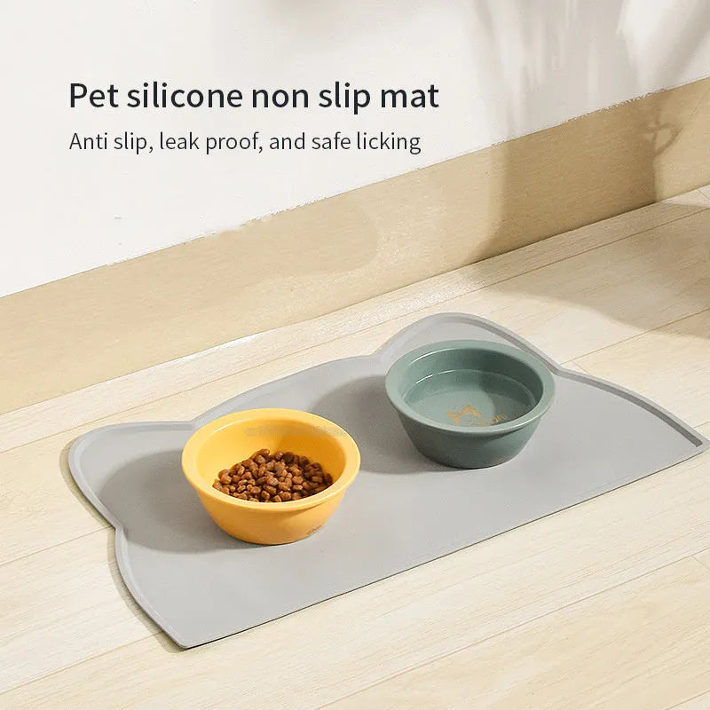 Cat head shaped silicone pet feeding mat in blue colour measuring 44cm by 24cm