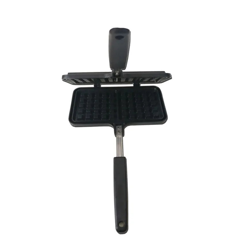 Black aluminium alloy waffle cake mold with nonstick plates and locking handle on gas stove