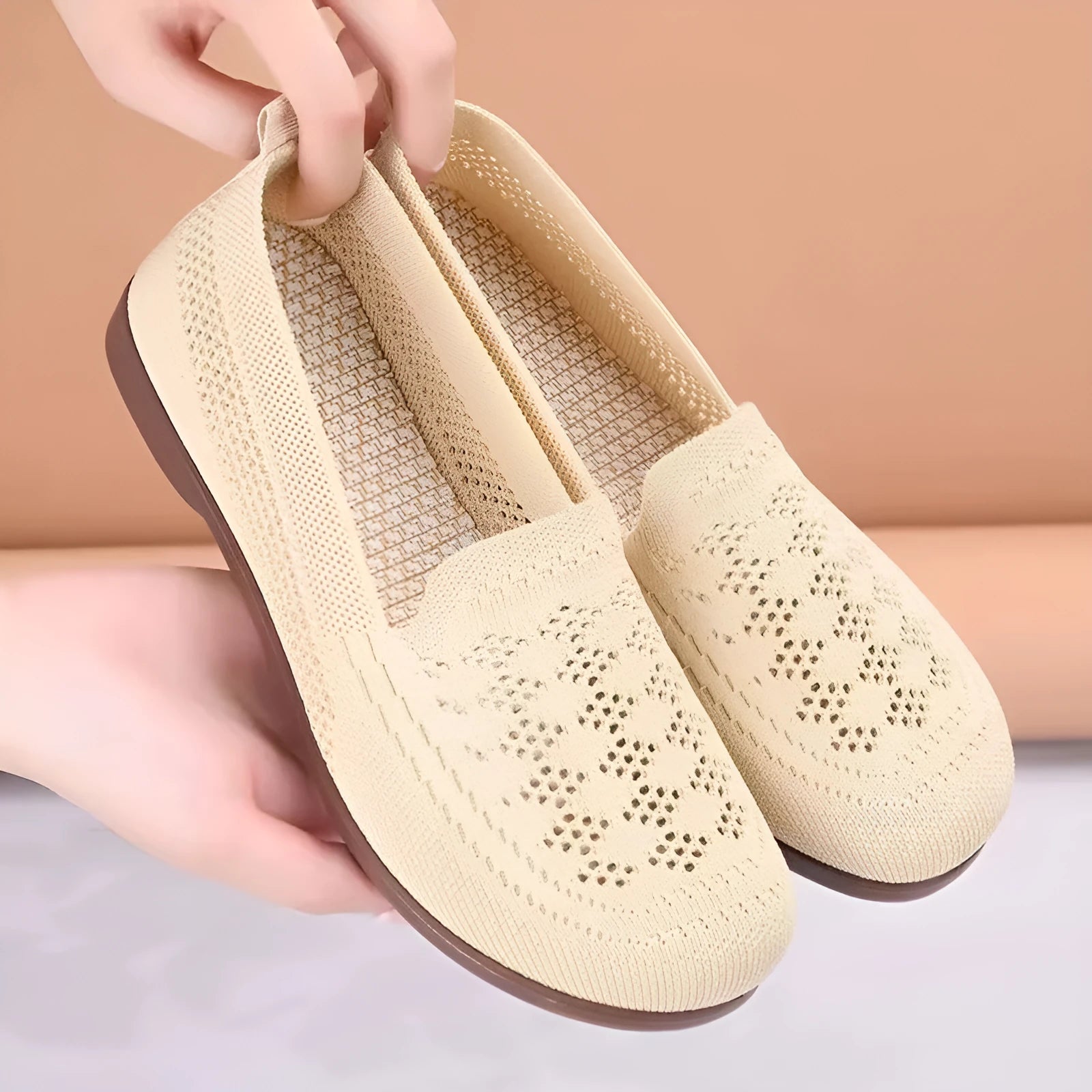 Women's beige low-top casual slip-on shoes with mesh upper and round toe.