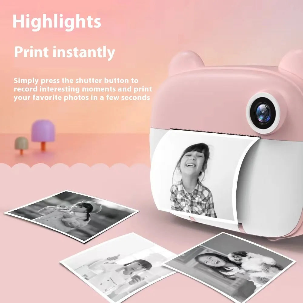 Pink children's SLR-style dual lens toy camera on a white background.