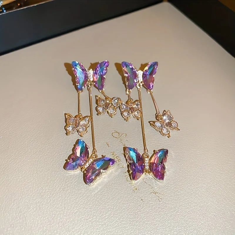 Silver Needle blue purple butterfly tassel earrings with crystal flowers on a 4.5cm alloy drop.