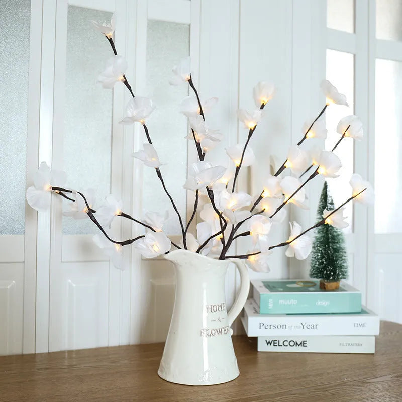 Pink phalaenopsis orchid branch LED light with fabric shade on a wooden surface, measuring 65cm long.