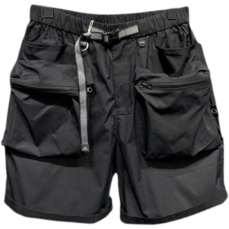 Men's black loose-fitting work shorts with elastic waistband and pockets, laid flat