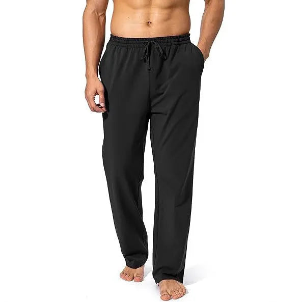Men's loose casual trousers in black polyester fabric for sports and leisure wear