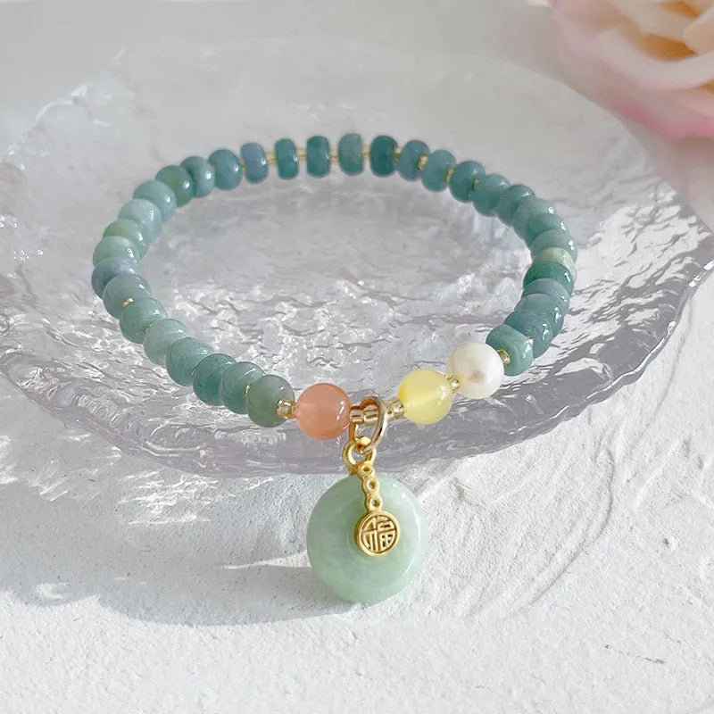 Women's simple ethnic style jade bracelet with Hetian jade gourd bead, peace buckle charm, and fu character pendant
