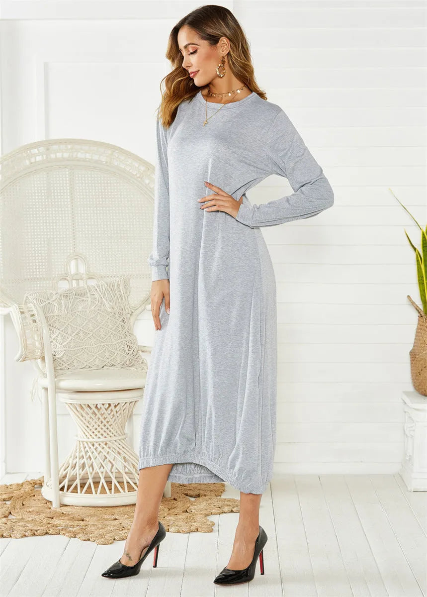 Black lace-up crew neck lantern dress on a hanger, showing loose long fit and threaded detail.