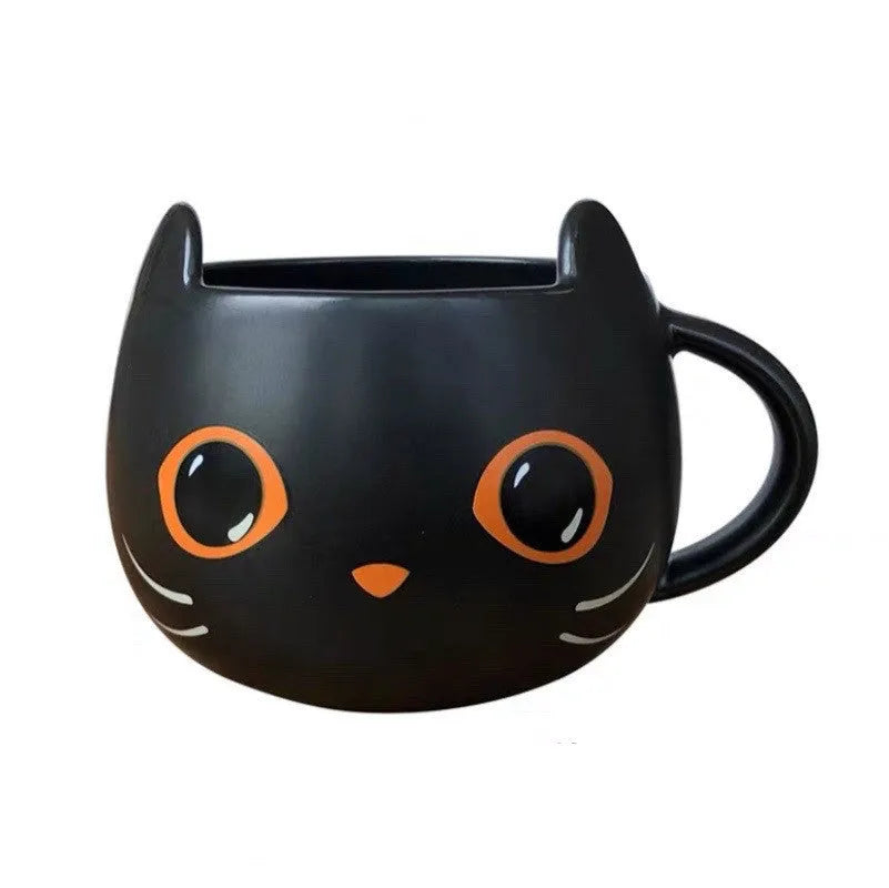 Black ceramic cat-shaped mug with pumpkin decoration and optional spoon lid, 355ml capacity.
