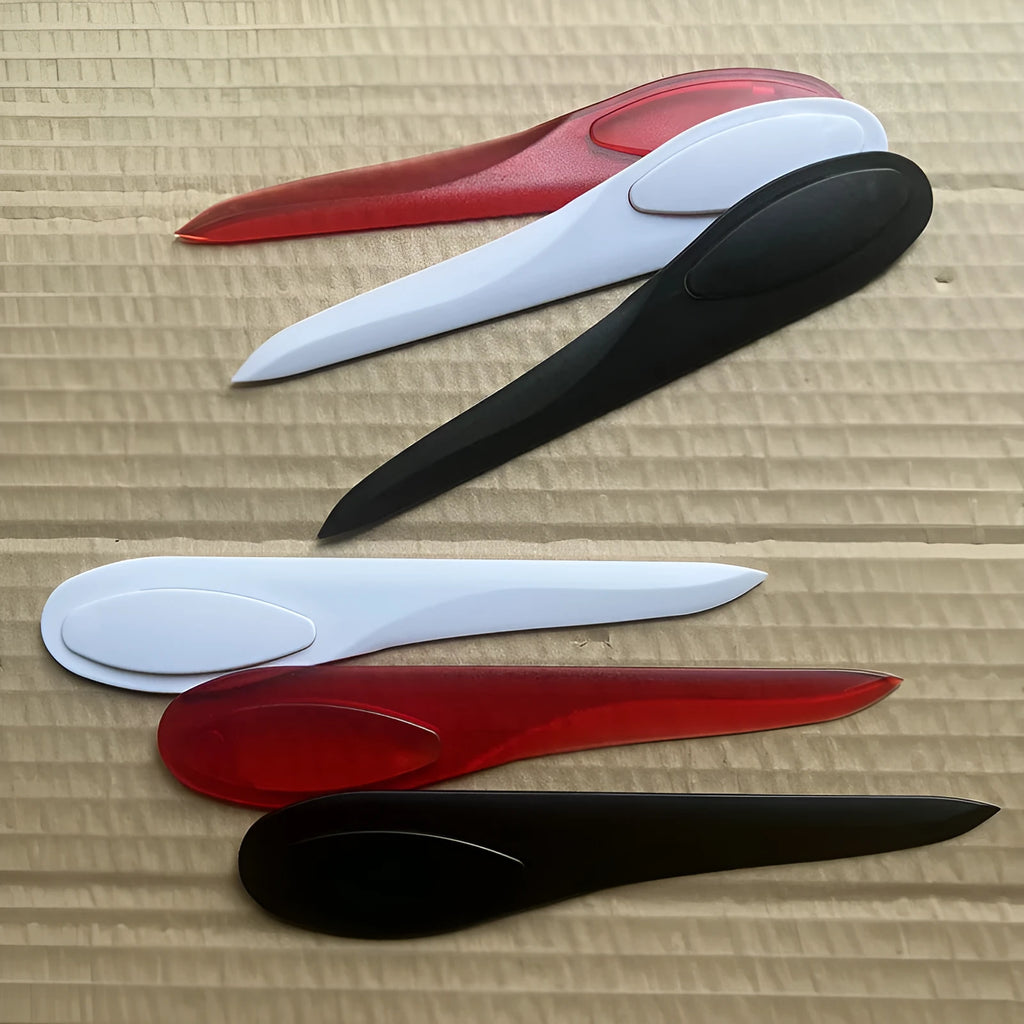 Willow Leaf Art A4 plastic paper cutter with colourful handle on white background