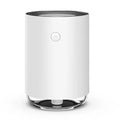 Green ultrasonic humidifier and essential oil diffuser with colour-changing LED night light.