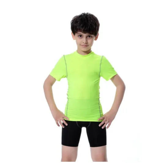 Children's black and green polyester-spandex sportswear set with T-shirt and trousers.