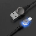 Black universal fast charging cable with rotating zinc alloy head for Apple and Android phones.