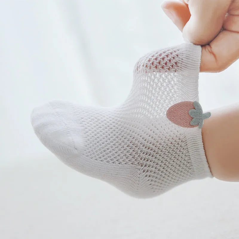 Baby mesh socks in pastel colours, cotton blend, XS to L sizes for 0-5 years, on a white background