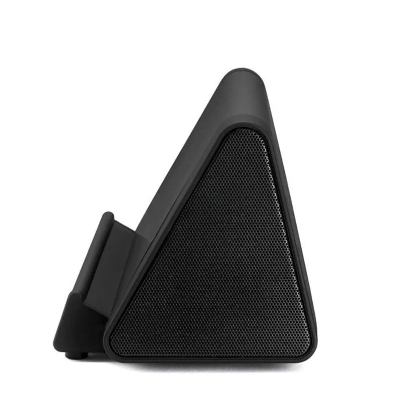 Black and white wireless Bluetooth mini speaker with charging cable