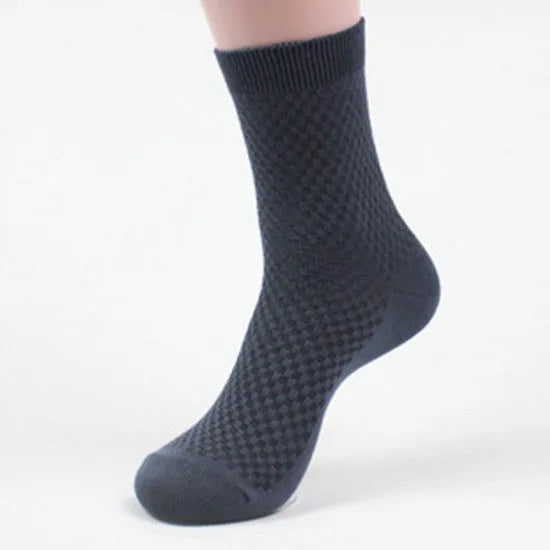 Men's bamboo fibre socks with a small square pattern in five colour options.