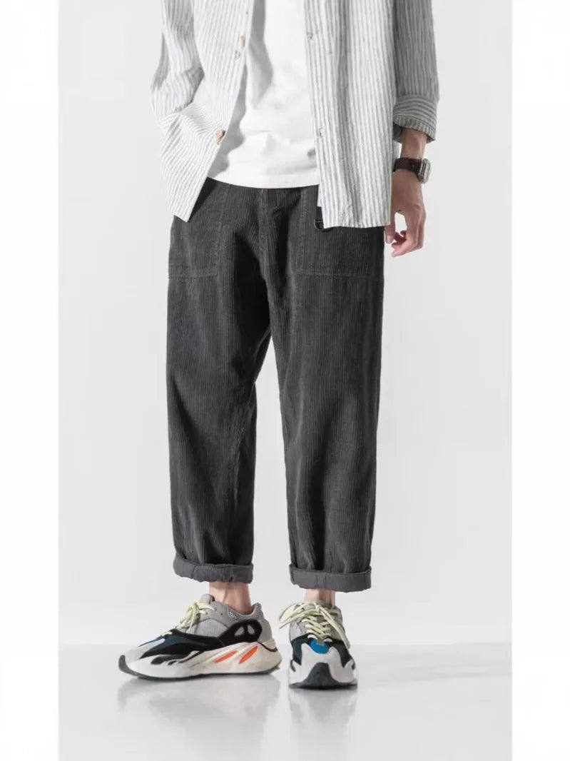 Loose straight-leg pants with tapered wide-leg design in chemical fibre blend fabric