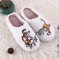 White fluffy slippers with cartoon pattern, rubber soles, and artificial wool lining