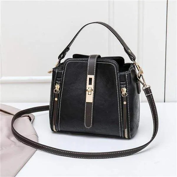 Faux leather women shoulder bag in black with detachable handle and adjustable strap