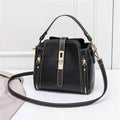 Faux leather women shoulder bag in black with detachable handle and adjustable strap
