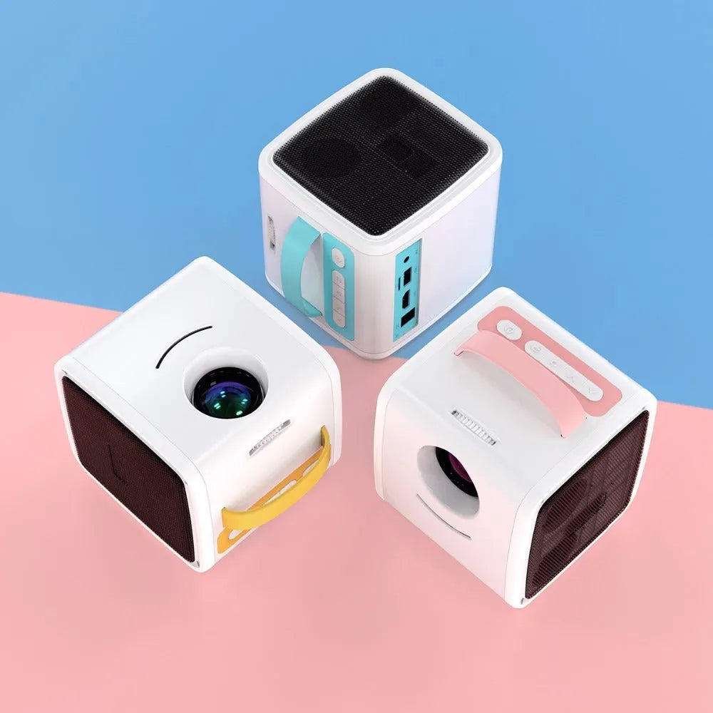Mini home theater projector displaying a 20-70 inch image on a wall with blue or pink colour options and US plug