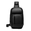 Black medium outdoor PVC shoulder bag with an air cushion strap and organiser pockets.
