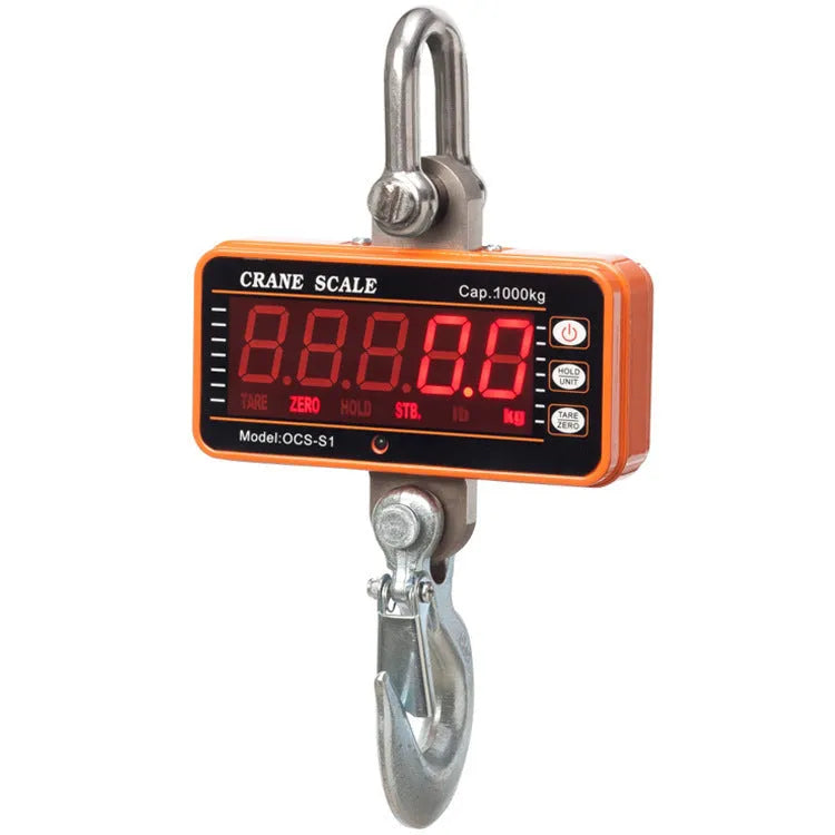 Orange electronic crane scale with digital display, shown suspended from a hook.