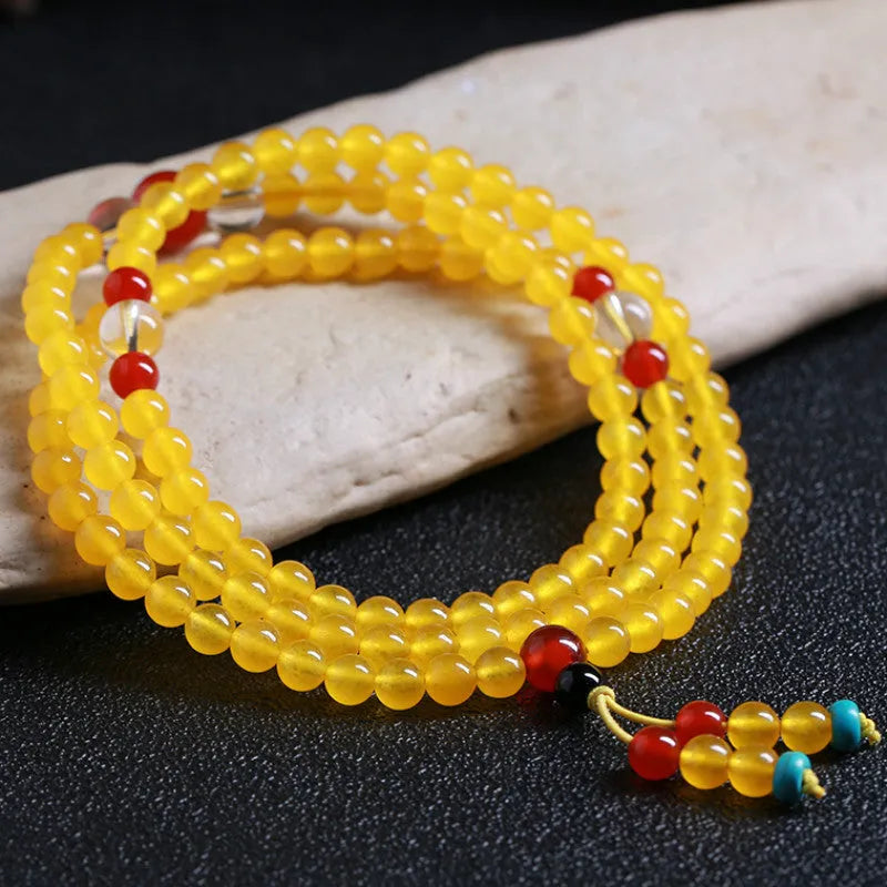 108-bead agate necklace with crystal lucky cat charm and geometric polished beads