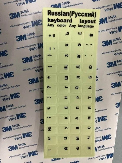 Sheet of glowing PVC keyboard stickers for Arabic, Thai, Hebrew, French, Italian and German languages