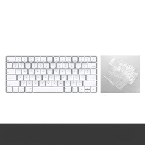 White Apple Bluetooth wireless keyboard with ultra-thin metal casing on a desk