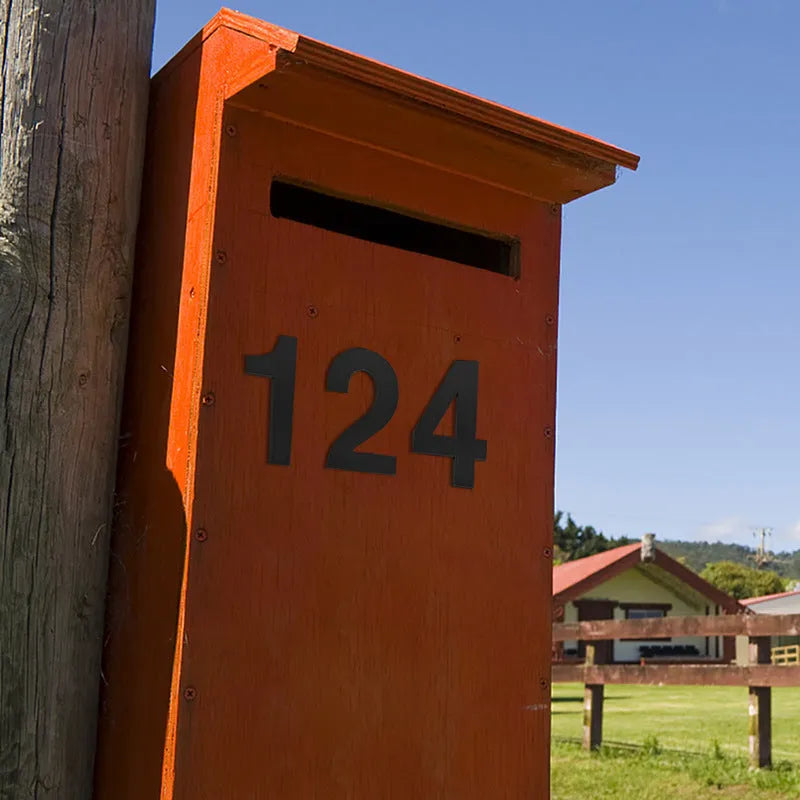 Black stainless steel self-adhesive house number measuring 7.5cm tall with waterproof outdoor performance