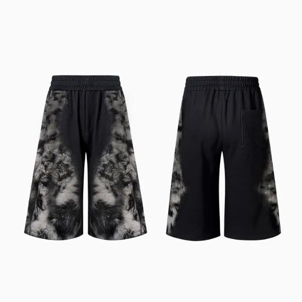 Women's grey printed hoodie, matching loose trousers, and seven-inch shorts laid flat as a three-piece co-ord set.