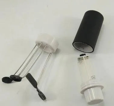 White and black automatic stirrer blender on a kitchen counter