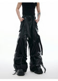 Black loose-fit trousers with quilted stitching pattern and multiple pockets