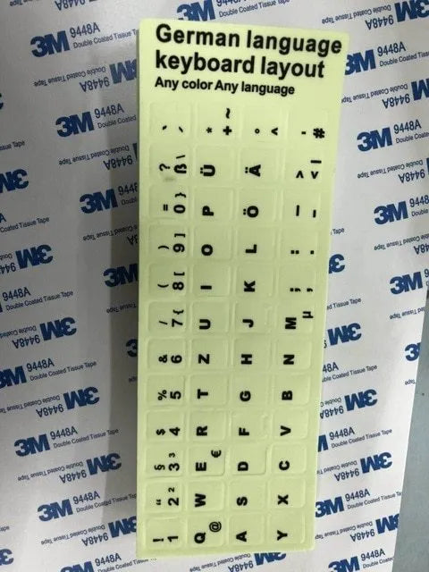 Sheet of glowing PVC keyboard stickers for Arabic, Thai, Hebrew, French, Italian and German languages