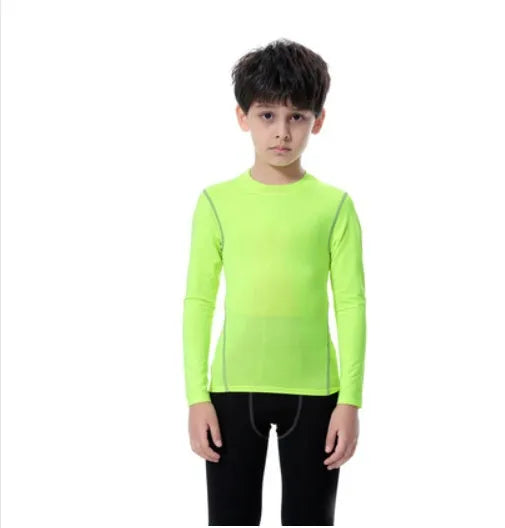 Children's black and green polyester-spandex sportswear set with T-shirt and trousers.