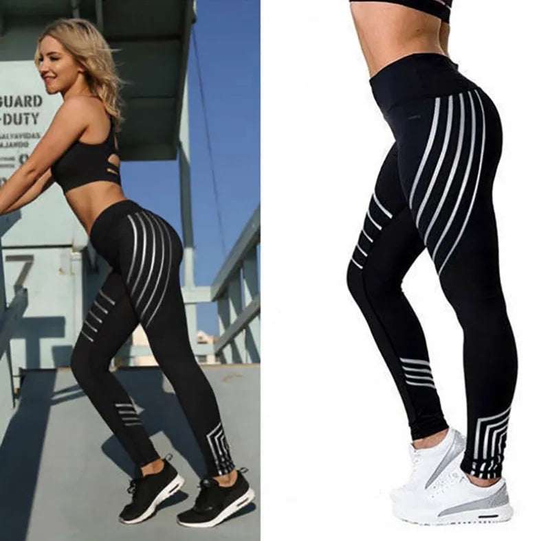 Women's black workout leggings with a glowing print pattern on the legs.