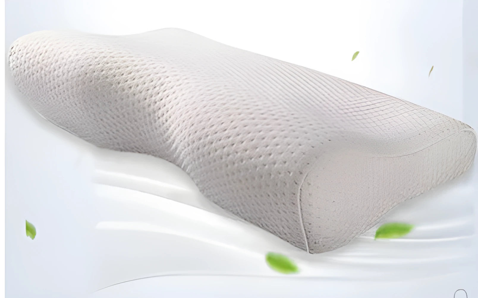 Butterfly-shaped blue memory foam cervical pillow on a bed.