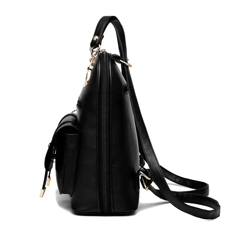 Women's PU leather dual-use backpack in black, flat lay view showing front and strap