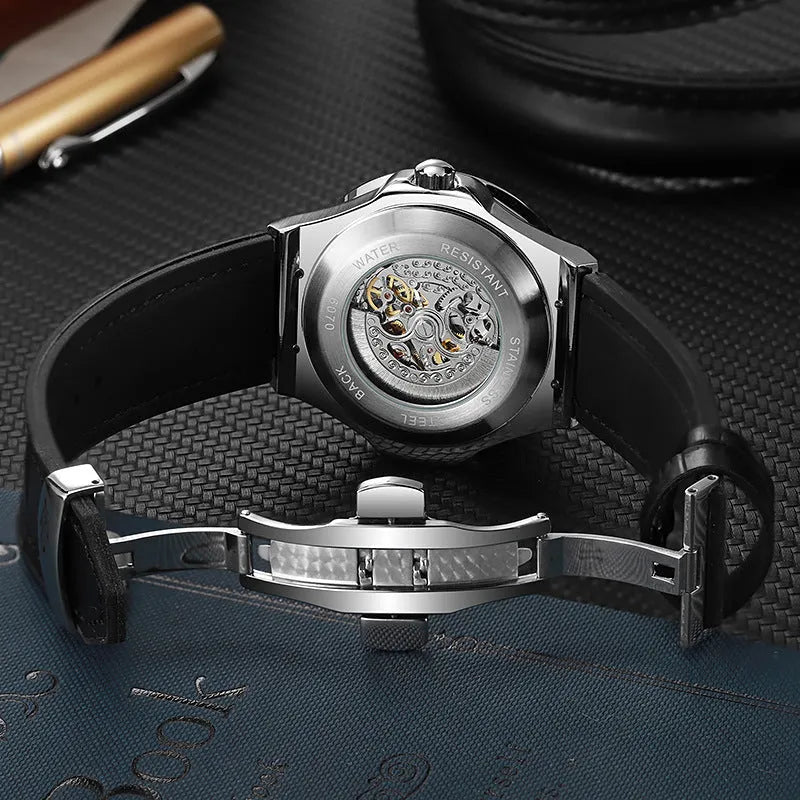 Men's automatic mechanical watch with hollow movement, diamond studs on white shell case, and a black dial.