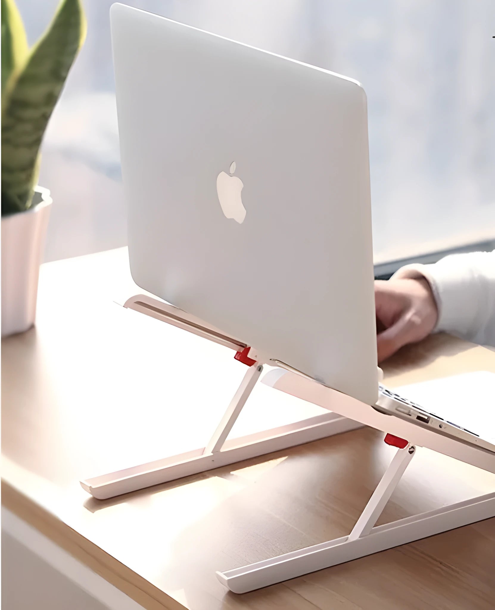 White aluminium laptop stand for Apple MacBook with folding design